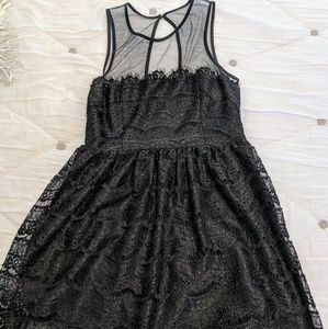 Black lace dress with sheer neckline